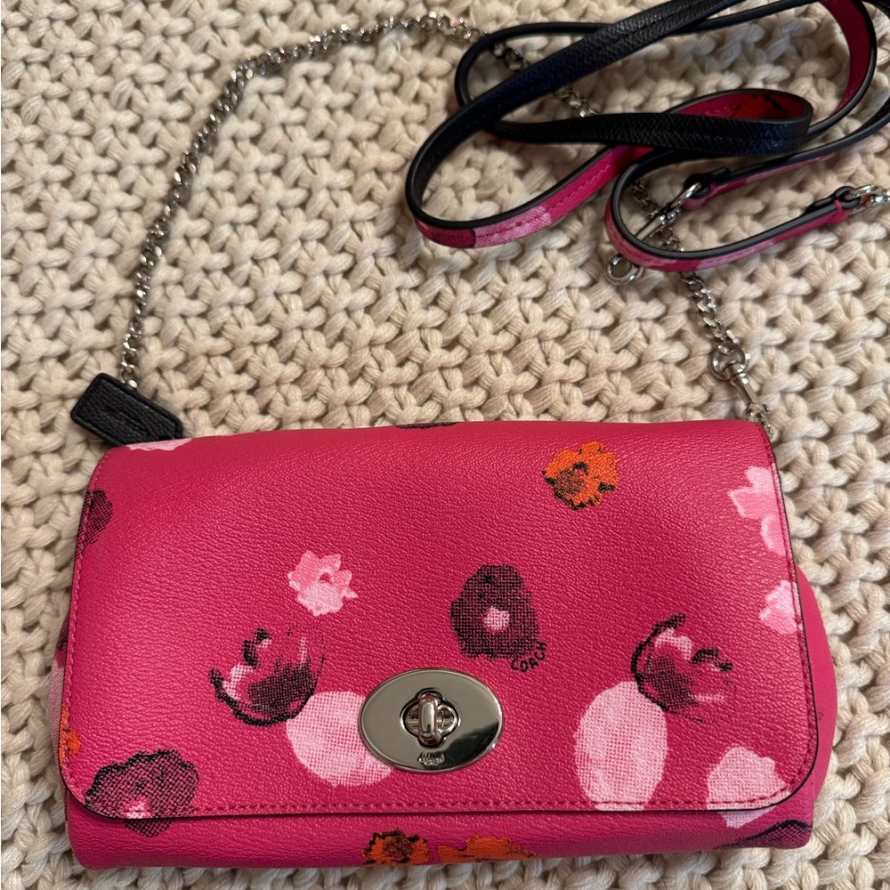 Coach Purse used once!  Measures 9”x5”x1.5”.  Includes shoulder strap never used